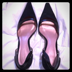 Pointy anointy black heels